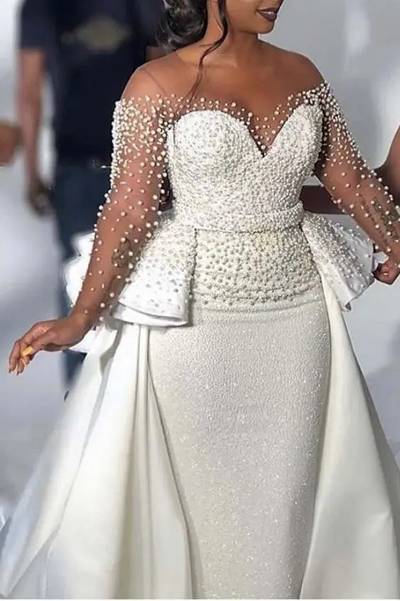 Elegant Bridal Dresses Illusion O Neck Beaded Pearls 2023 African Bridal Dress Satin Long Sleeves Gown Styles
Elegant Bridal Dresses Illusion O Neck Beaded Pearls 2023 African Bridal Dress Satin Long Sleeves Gown Styles