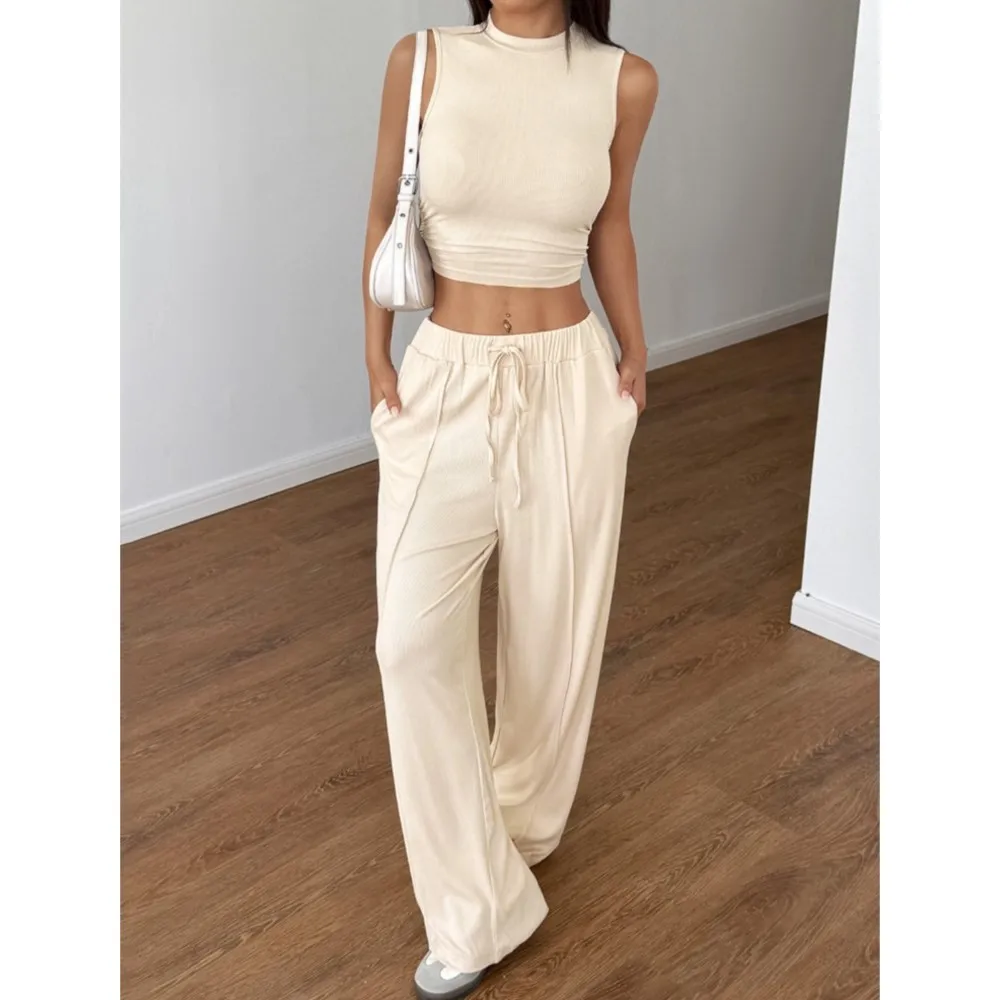 Casual Sleeveless O Neck Short Vest Two-piece Women's Spring Summer New Fashion Pocket Loose-fitting Waist Female Long Pants Set
Casual Sleeveless O Neck Short Vest Two-piece Women's Spring Summer New Fashion Pocket Loose-fitting Waist Female Long Pants Set