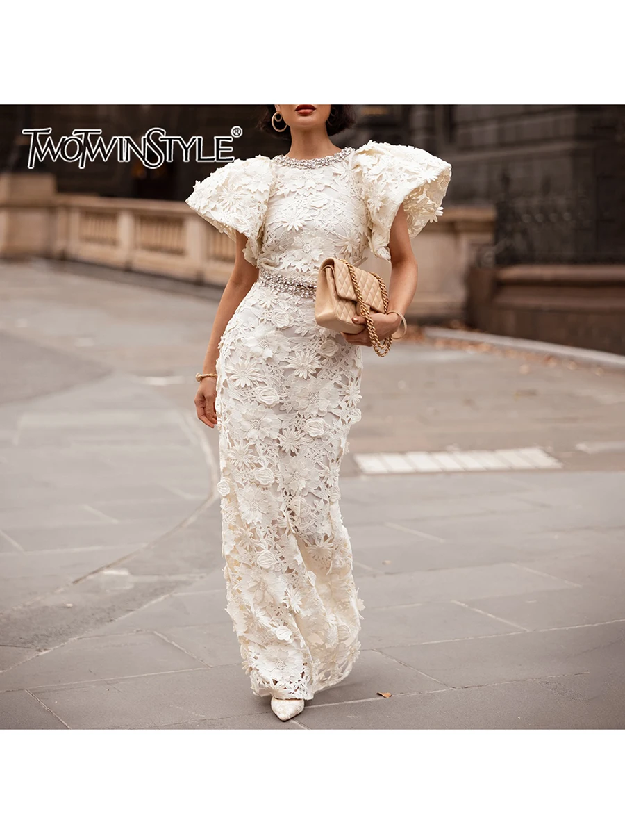TWOTWINSTYLE Spliced Diamond Embroidery Two Piece Sets for Women O Neck Short Sleeve Top High Waist Split Skirt Solid Set Female
TWOTWINSTYLE Spliced Diamond Embroidery Two Piece Sets for Women O Neck Short Sleeve Top High Waist Split Skirt Solid Set Female