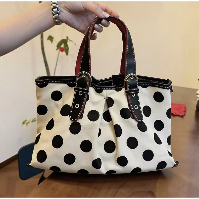Korean Polka Dot Waterproof Canvas Tote Bag Belt Buckle Large Capacity Shoulder Bag Retro Casual Versatile Daily Commuting Bag
Korean Polka Dot Waterproof Canvas Tote Bag Belt Buckle Large Capacity Shoulder Bag Retro Casual Versatile Daily Commuting Bag
