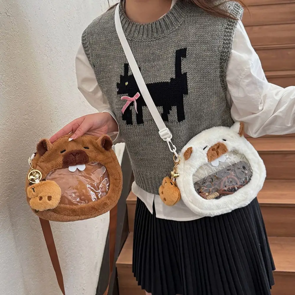 Мультяшная капибара, плюшевая детская школьная сумка Itabag с мягкими животными, на одно плечо с подвеской, прозрачная сумка через плечо для девочек
Мультяшная капибара, плюшевая детская школьная сумка Itabag с мягкими животными, на одно плечо с подвеской, прозрачная сумка через плечо для девочек