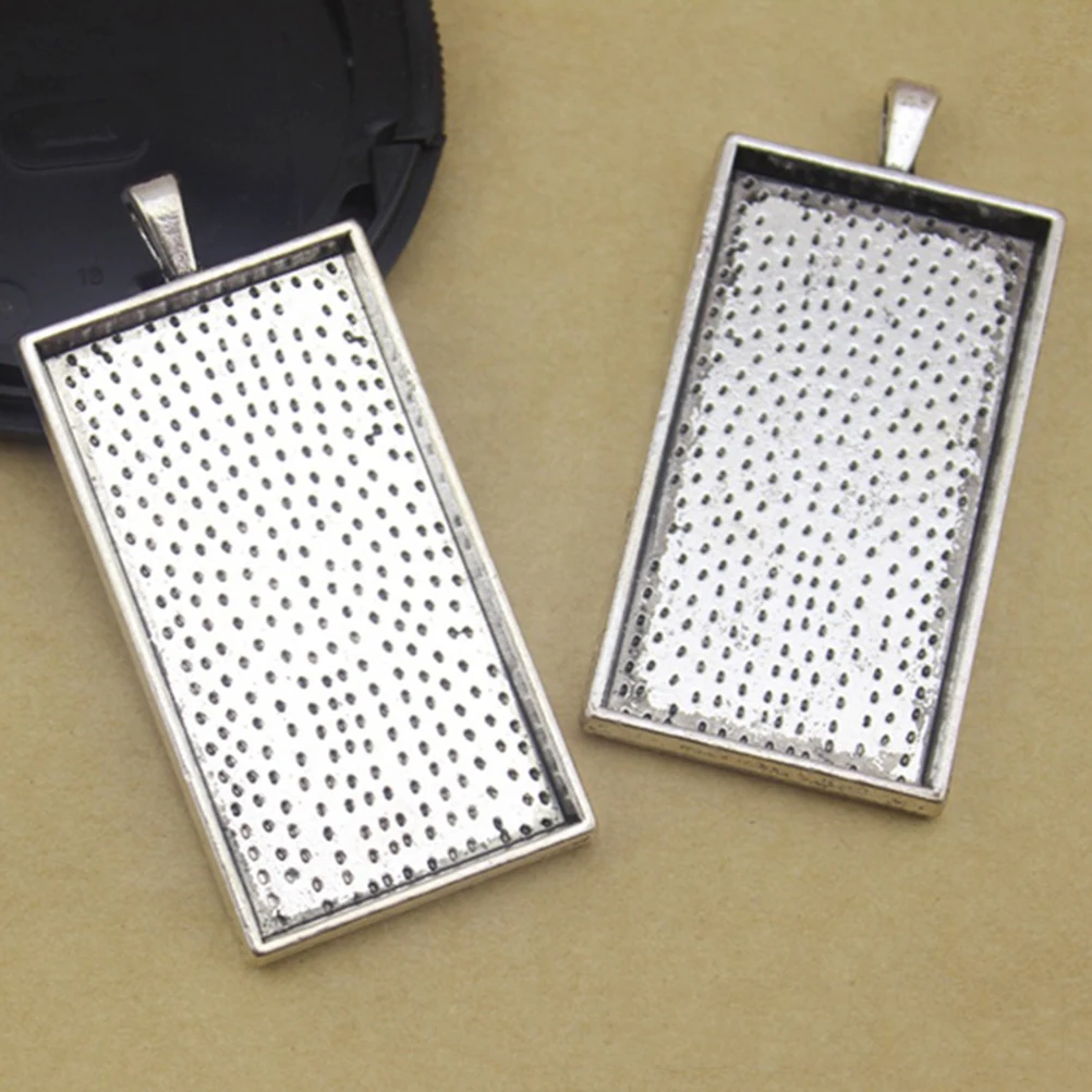 10pcs Vintage Alloy Pendant Trays 50mmx25mm 4mm Bore Blank Metal Trays for Resin Crafts Photo Cameo Jewelry Making Handmade
10pcs Vintage Alloy Pendant Trays 50mmx25mm 4mm Bore Blank Metal Trays for Resin Crafts Photo Cameo Jewelry Making Handmade