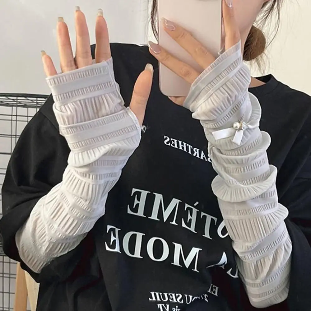 Pearl Bow Sun Protection Arm Sleeves Anti UV Ultra Thin Ice Silk Arm Sleeves Breathable Ice Silk Fabric Women Arm Sleeves
Pearl Bow Sun Protection Arm Sleeves Anti UV Ultra Thin Ice Silk Arm Sleeves Breathable Ice Silk Fabric Women Arm Sleeves