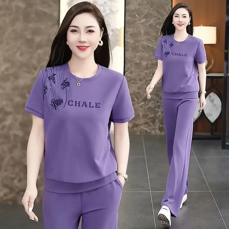 Summer Sports Set For Women Casual Embroidered Short Sleeved Women's Sports Suit Round Neck Sweatshirt Mom Pants Two-piece Set
Summer Sports Set For Women Casual Embroidered Short Sleeved Women's Sports Suit Round Neck Sweatshirt Mom Pants Two-piece Set