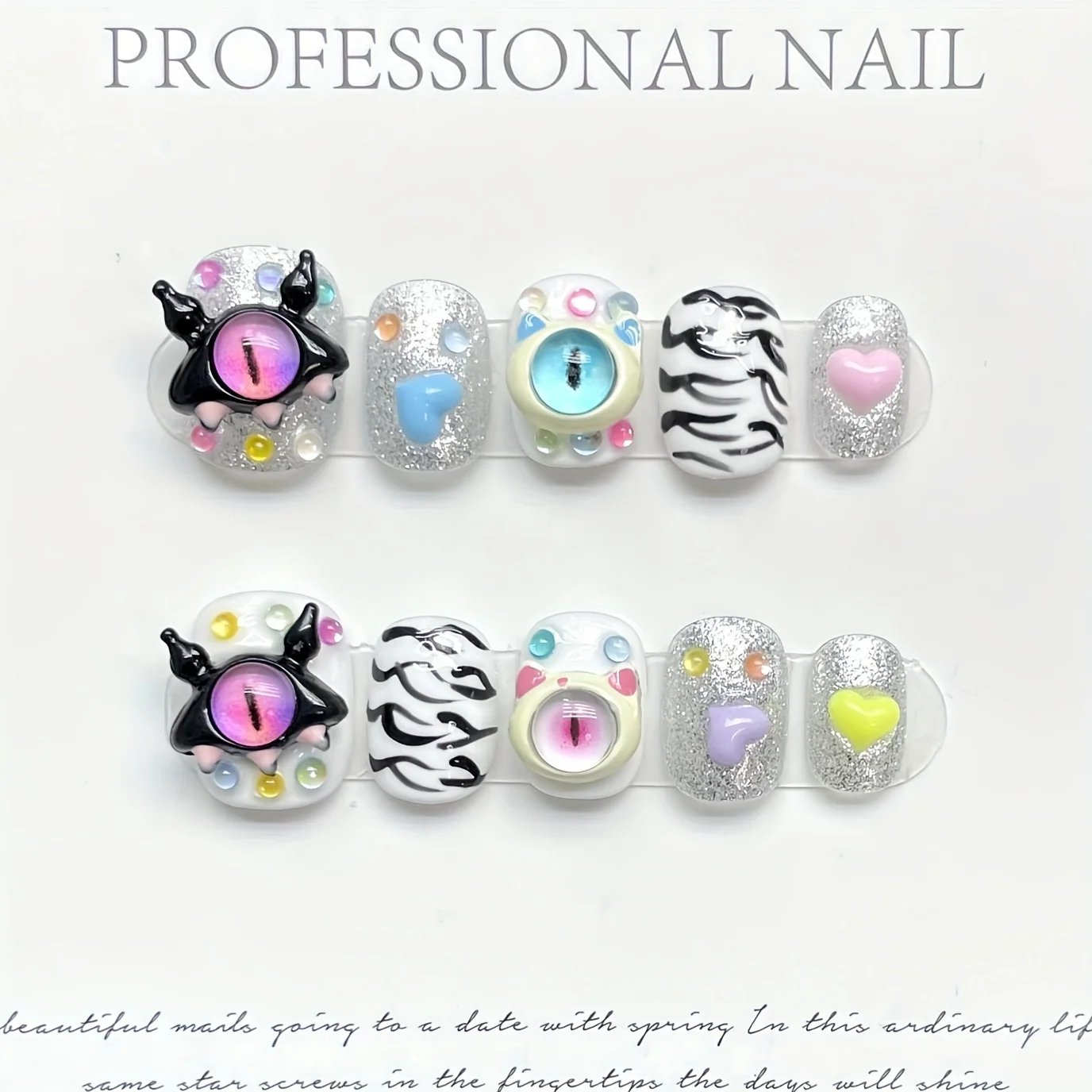 10 шт. высококачественных коротких, милых, стильных, крутых накладных ногтей ручной работы, с дизайном «Маленькие монстры», «Маленькие демони», разноцветные, с большими глазами.
10 шт. высококачественных коротких, милых, стильных, крутых накладных ногтей ручной работы, с дизайном «Маленькие монстры», «Маленькие демони», разноцветные, с большими глазами.