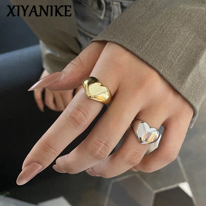Модное креативное Золотое кольцо XIYANIKE в форме сердца серебряного цвета, светлое роскошное металлическая текстура, украшения для девушек и пар
Модное креативное Золотое кольцо XIYANIKE в форме сердца серебряного цвета, светлое роскошное металлическая текстура, украшения для девушек и пар