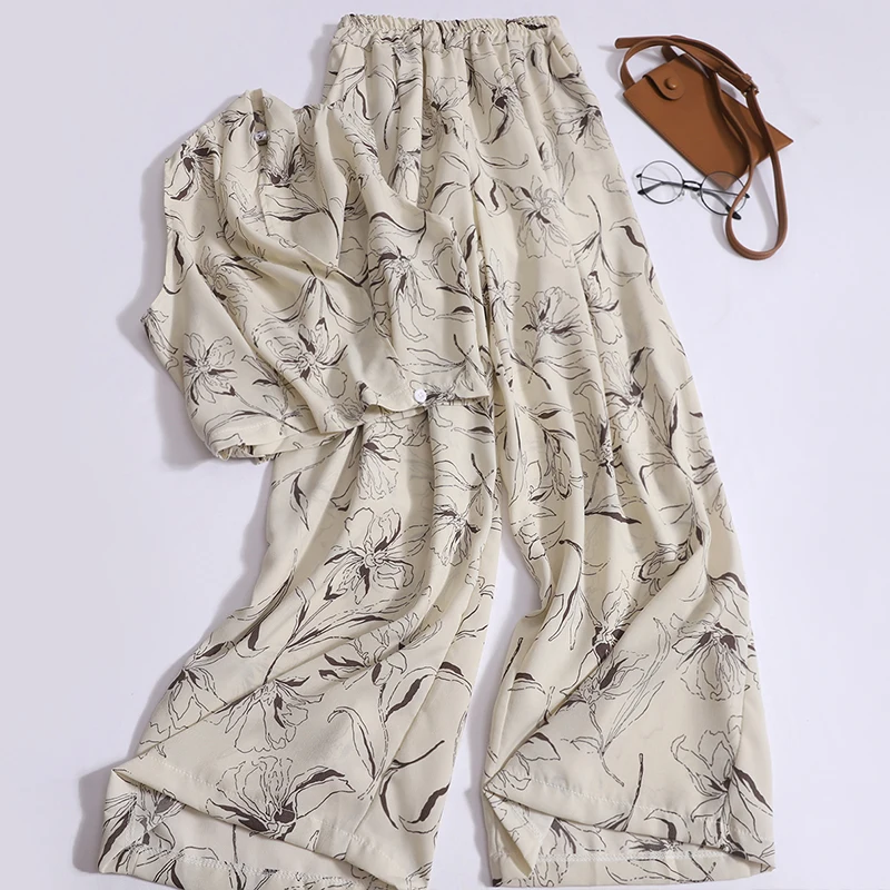 Ink printed vest + wide-leg pants 2-piece set women's summer short top V-neck sleeveless high-waisted trousers Korean fashion
Ink printed vest + wide-leg pants 2-piece set women's summer short top V-neck sleeveless high-waisted trousers Korean fashion