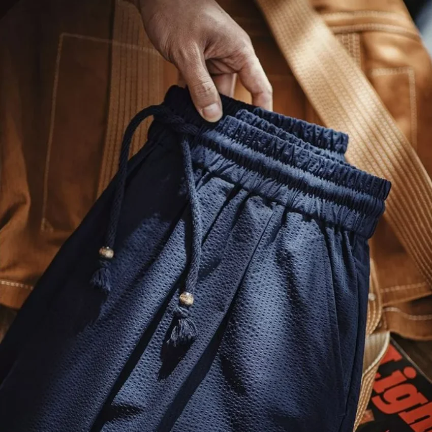 Maden повседневные мужские легкие брюки из хлопка с эластичной резинкой на талии, свободные широкие дышащие брюки, темно-синие универсальные брюки
Maden повседневные мужские легкие брюки из хлопка с эластичной резинкой на талии, свободные широкие дышащие брюки, темно-синие универсальные брюки