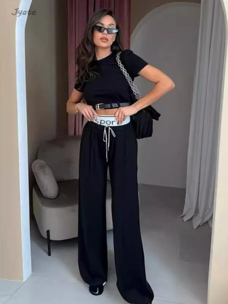 2024 New Sportwear Slim Summer T-shirt 2 Piece Set Women Outfit Casual High Waist Drawstring Letter Fashion Wide Leg Pant Sets
2024 New Sportwear Slim Summer T-shirt 2 Piece Set Women Outfit Casual High Waist Drawstring Letter Fashion Wide Leg Pant Sets