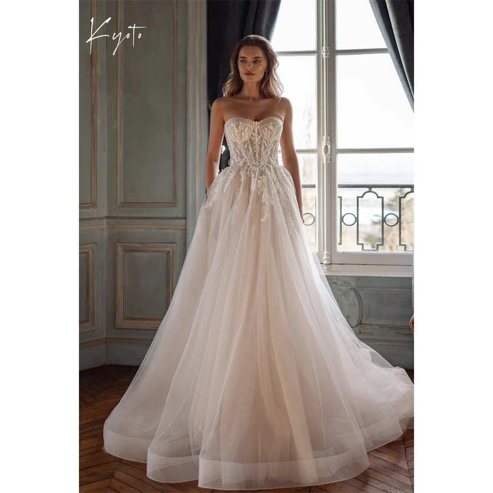 Kyoto белое тюлевое свадебное платье без рукавов по индивидуальному заказу без бретелек на молнии сзади, элегантное вечернее платье трапециевидной формы 2025
Kyoto белое тюлевое свадебное платье без рукавов по индивидуальному заказу без бретелек на молнии сзади, элегантное вечернее платье трапециевидной формы 2025