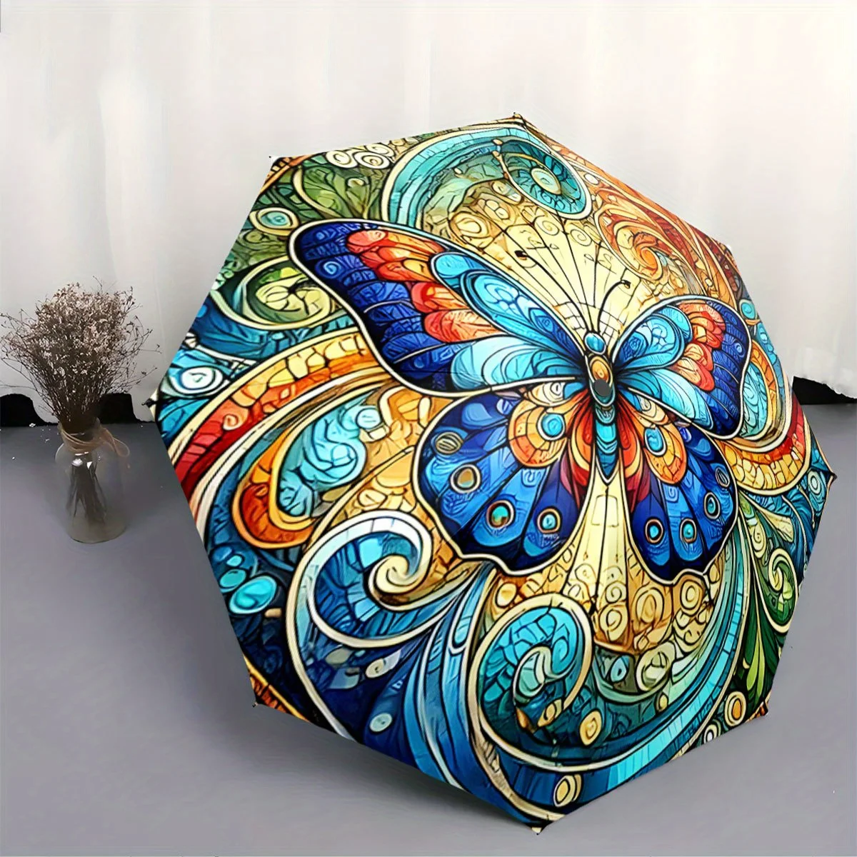 Automatic Folding Umbrella A colorful, intricate butterfly with swirling patterns. Portable collapsible design, casual outdoor
Automatic Folding Umbrella A colorful, intricate butterfly with swirling patterns. Portable collapsible design, casual outdoor
