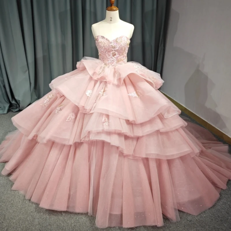 Светло-розовое блестящее бальное платье для Quinceanera с пайетками, аппликациями, кружевом, бисером, кристаллами, многоярусным фатином, корсетом, открытыми плечами, для Sweet 16
Светло-розовое блестящее бальное платье для Quinceanera с пайетками, аппликациями, кружевом, бисером, кристаллами, многоярусным фатином, корсетом, открытыми плечами, для Sweet 16
