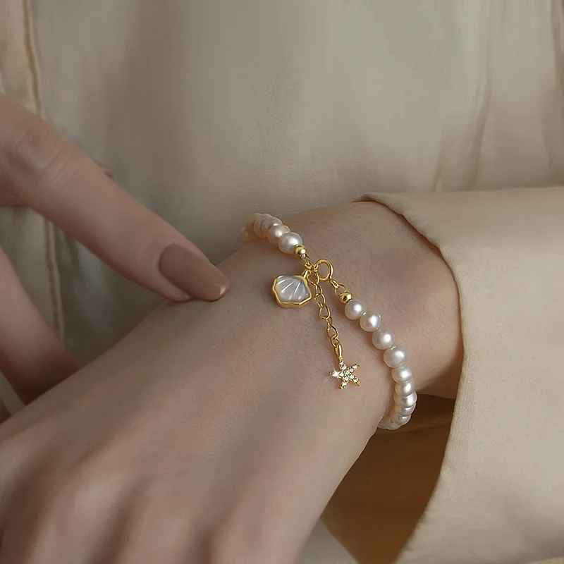 Trendy Shell & Star Design 100% Natural Freshwater Pearl 14K Gold Filled Ladies Bracelet Wholesale Jewelry For Women Gifts
Trendy Shell & Star Design 100% Natural Freshwater Pearl 14K Gold Filled Ladies Bracelet Wholesale Jewelry For Women Gifts