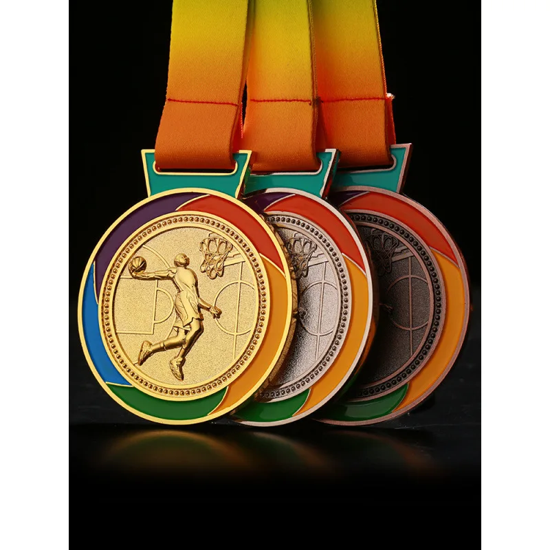 Medals for the first, second and third place winners in the junior student basketball competition: gold, silver and bronze.
Medals for the first, second and third place winners in the junior student basketball competition: gold, silver and bronze.