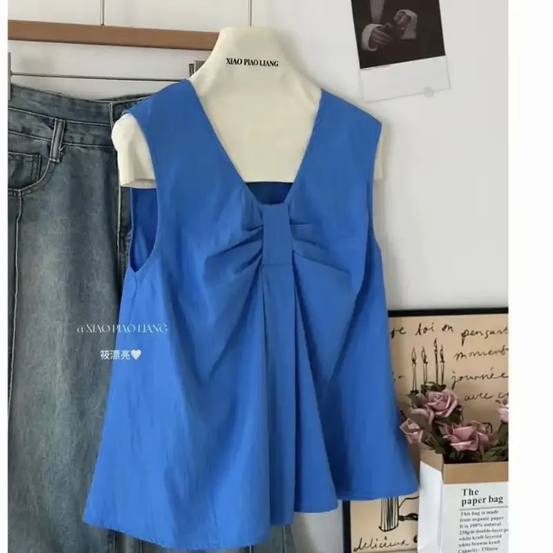 V Neck Sleeveless Blue Top With Bow Detail Casual Loose Fit Women Summer Wear
V Neck Sleeveless Blue Top With Bow Detail Casual Loose Fit Women Summer Wear