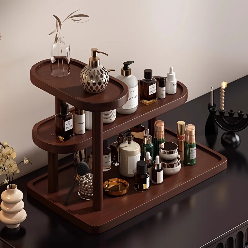 A Multi-Layer Storage Rack for Skincare Products on a Vanity, Designed for Organizing Lipsticks, Perfumes, And Cosmetics.
A Multi-Layer Storage Rack for Skincare Products on a Vanity, Designed for Organizing Lipsticks, Perfumes, And Cosmetics.