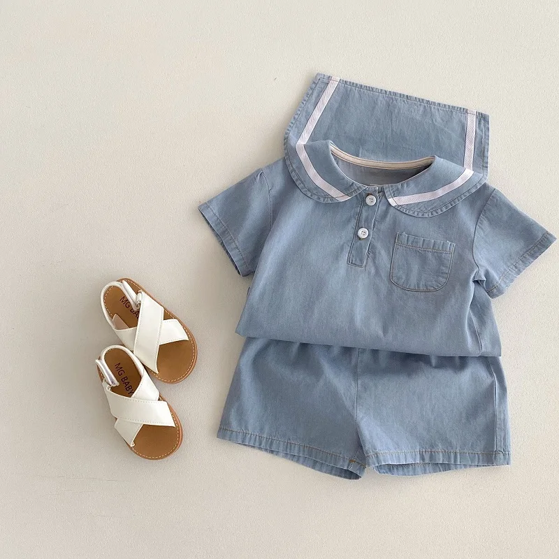 Baby clothes summer 0-4 year old girl set new navy collar lace denim girl short sleeved top and shorts two-piece set
Baby clothes summer 0-4 year old girl set new navy collar lace denim girl short sleeved top and shorts two-piece set
