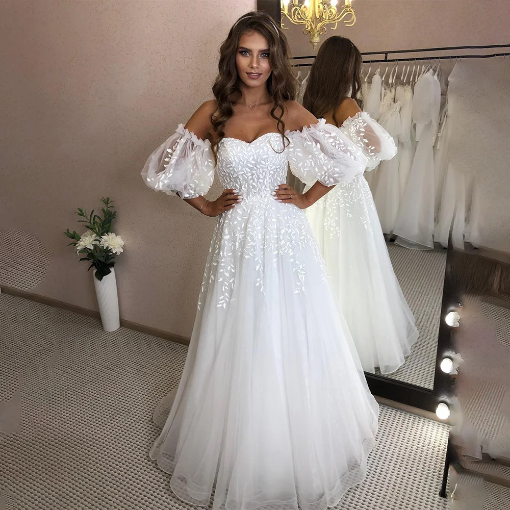 Charming Short Puff Sleeves Sweetheart Lace Applique Boho Beach A Line Wedding Dresses Custom Made Formal Bridal Grown 2023
Charming Short Puff Sleeves Sweetheart Lace Applique Boho Beach A Line Wedding Dresses Custom Made Formal Bridal Grown 2023
