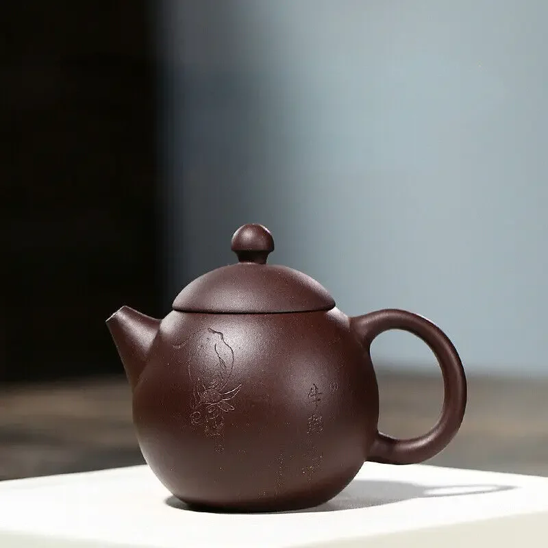 China Yixing Zisha Pottery Purple Clay Handmade 250cc Dragon Egg Teapot
China Yixing Zisha Pottery Purple Clay Handmade 250cc Dragon Egg Teapot