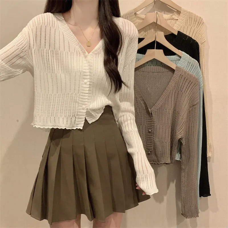 V-neck knitted sun protection shirt for women's summer new slim fit and slimming long sleeved cardigan short top
V-neck knitted sun protection shirt for women's summer new slim fit and slimming long sleeved cardigan short top