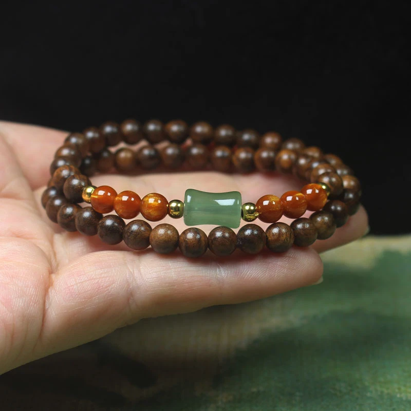 Black rosewood 6mm double-loop bracelet with green bamboo beads, simple Buddhist prayer bead jewelry
Black rosewood 6mm double-loop bracelet with green bamboo beads, simple Buddhist prayer bead jewelry