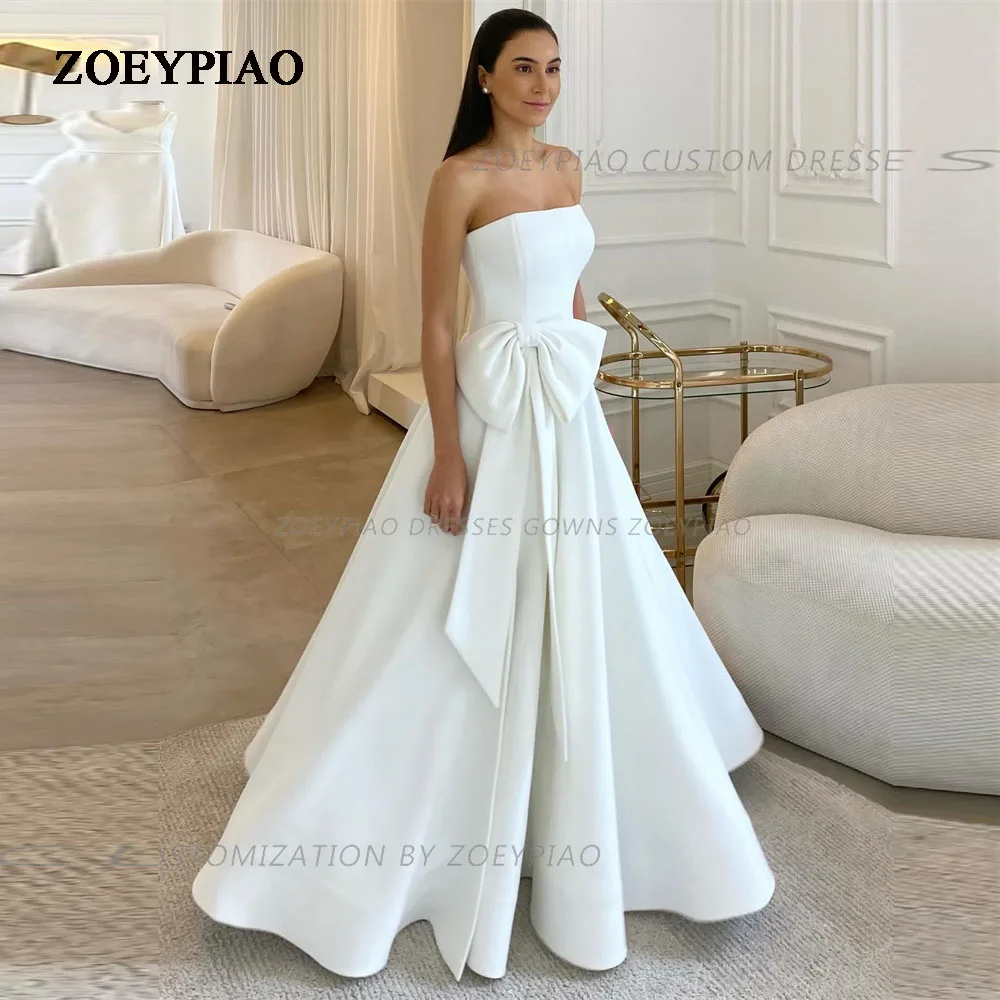 Gorgeous Satin Modern Wedding Dresses Elegant Bow Sleeveless Train Floor-Length Fluffy Princess Style Bridal Bride Gowns
Gorgeous Satin Modern Wedding Dresses Elegant Bow Sleeveless Train Floor-Length Fluffy Princess Style Bridal Bride Gowns