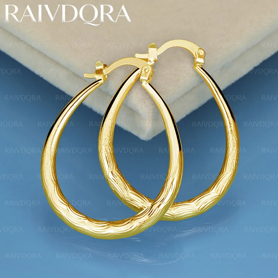 18K Gold Plated 30mm Wave Ring Loop Earrings For Women Fashion Charm Jewelry Party Engagement Wedding Accessories
18K Gold Plated 30mm Wave Ring Loop Earrings For Women Fashion Charm Jewelry Party Engagement Wedding Accessories