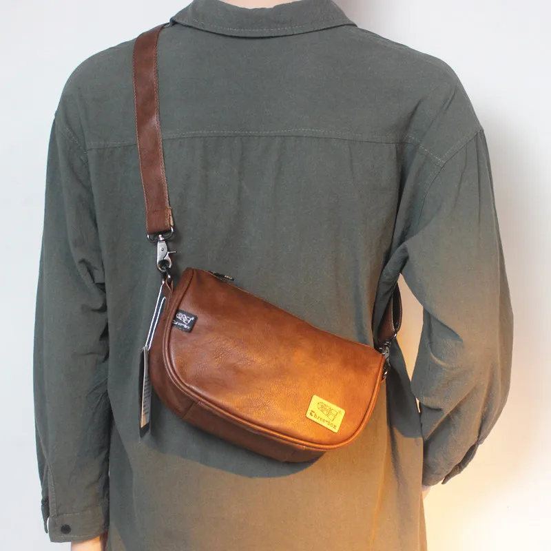 Korean Style Men's Single Shoulder Bag Fashionable PU Leather Saddle Bag Crossbody Bag for Young Men Casual Style
Korean Style Men's Single Shoulder Bag Fashionable PU Leather Saddle Bag Crossbody Bag for Young Men Casual Style