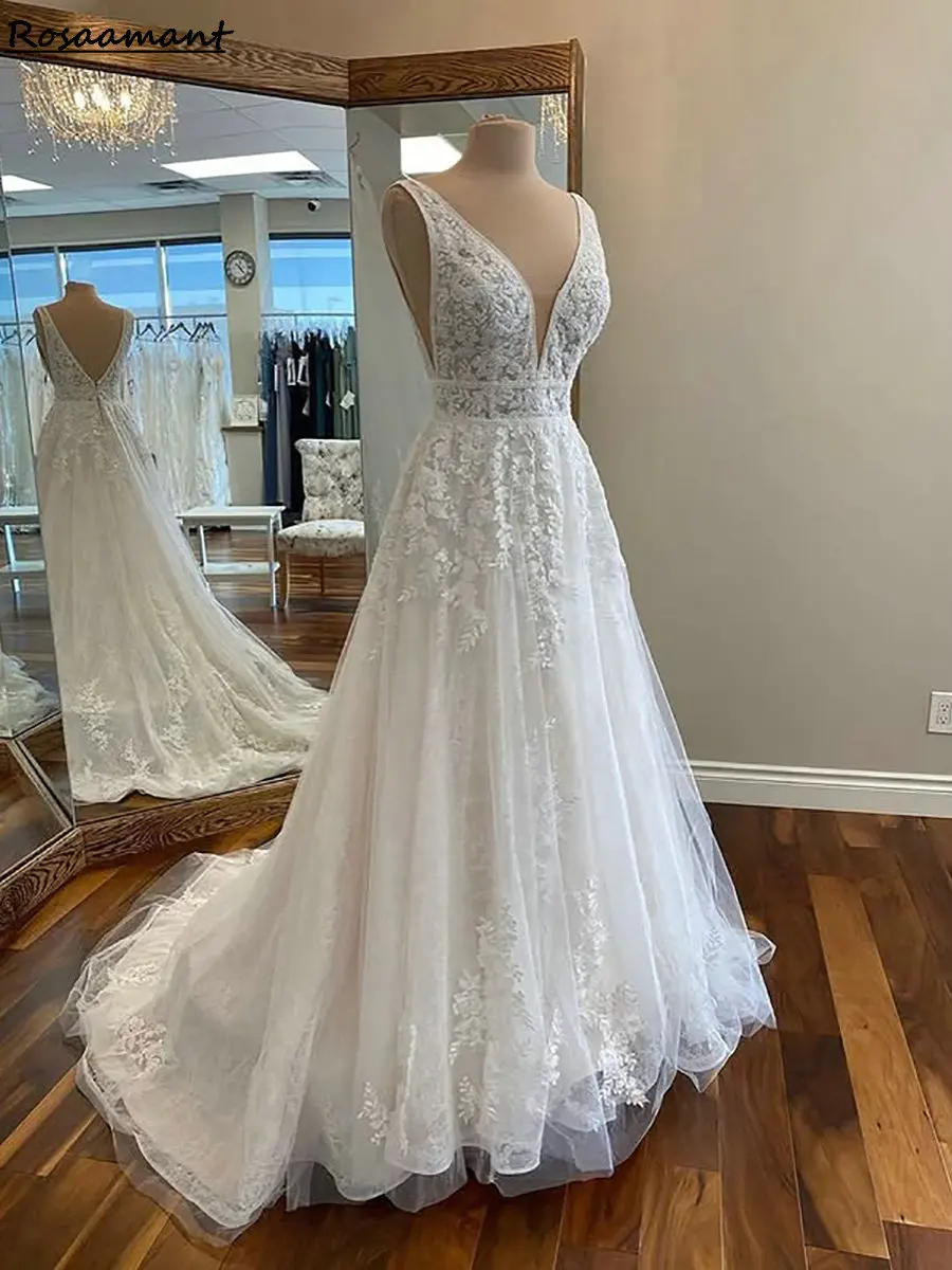Romantic V-Neck Sleeveless A-Line Wedding Dresses Illusion Appliques Lace Country Bridal Gowns
Romantic V-Neck Sleeveless A-Line Wedding Dresses Illusion Appliques Lace Country Bridal Gowns