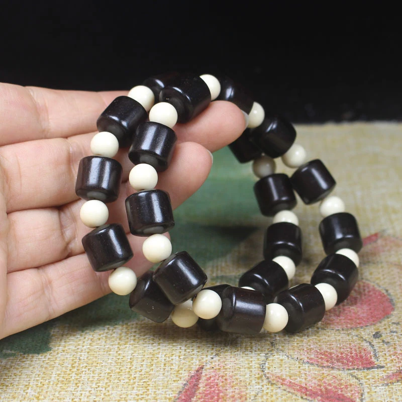 Ebony 12mm barrel beads bracelet with spacer beads, Buddhist prayer beads, fashionable bracelet for men and women
Ebony 12mm barrel beads bracelet with spacer beads, Buddhist prayer beads, fashionable bracelet for men and women