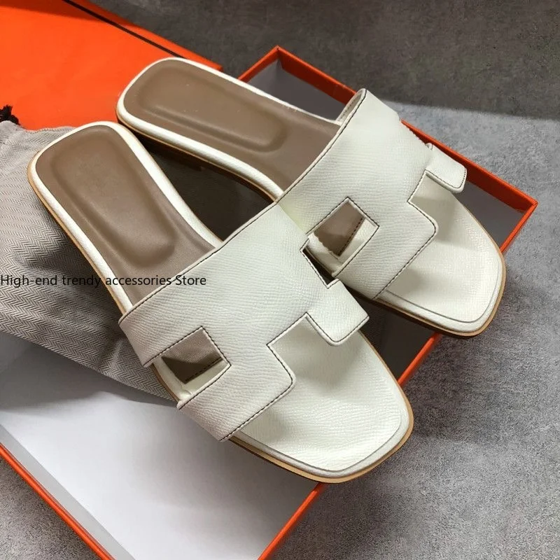 French Luxury Women's Shoes, 2026 New Dopamine Slippers for Women, Fashionable Flat-bottom Slip-on Anti-slip Outdoor and Indoor Cool Sandals with Flat Front Open-toe Style. Summer New Style Versatile High-end Girls' Fashion Slippers.
French Luxury Women's Shoes, 2026 New Dopamine Slippers for Women, Fashionable Flat-bottom Slip-on Anti-slip Outdoor and Indoor Cool Sandals with Flat Front Open-toe Style. Summer New Style Versatile High-end Girls' Fashion Slippers.