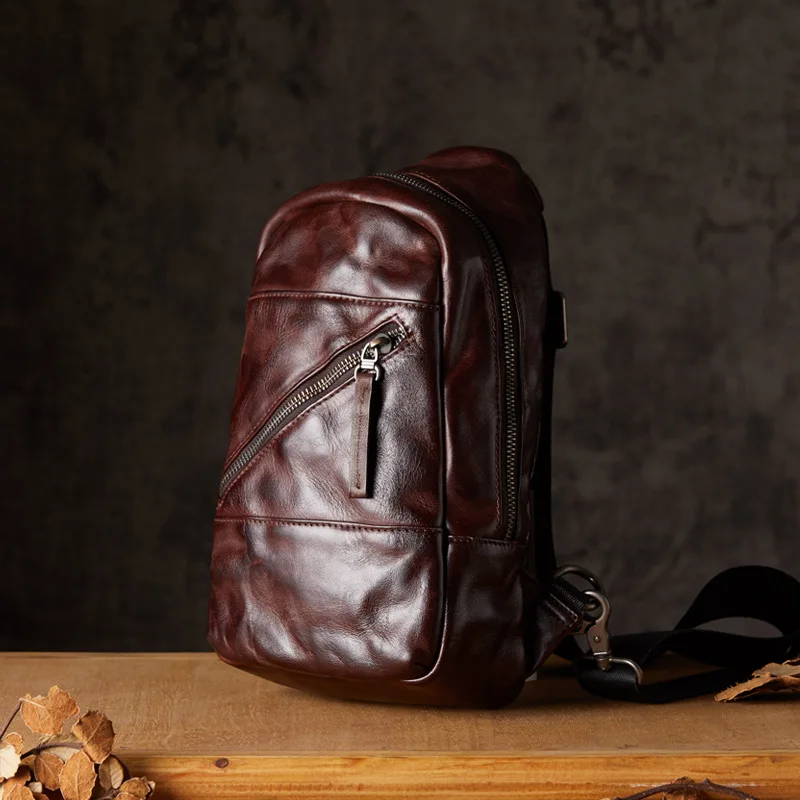 Handmade vegetable tanned cowhide breast bag Men's outdoor leisure shoulder messenger bag Personality versatile multi-functional
Handmade vegetable tanned cowhide breast bag Men's outdoor leisure shoulder messenger bag Personality versatile multi-functional