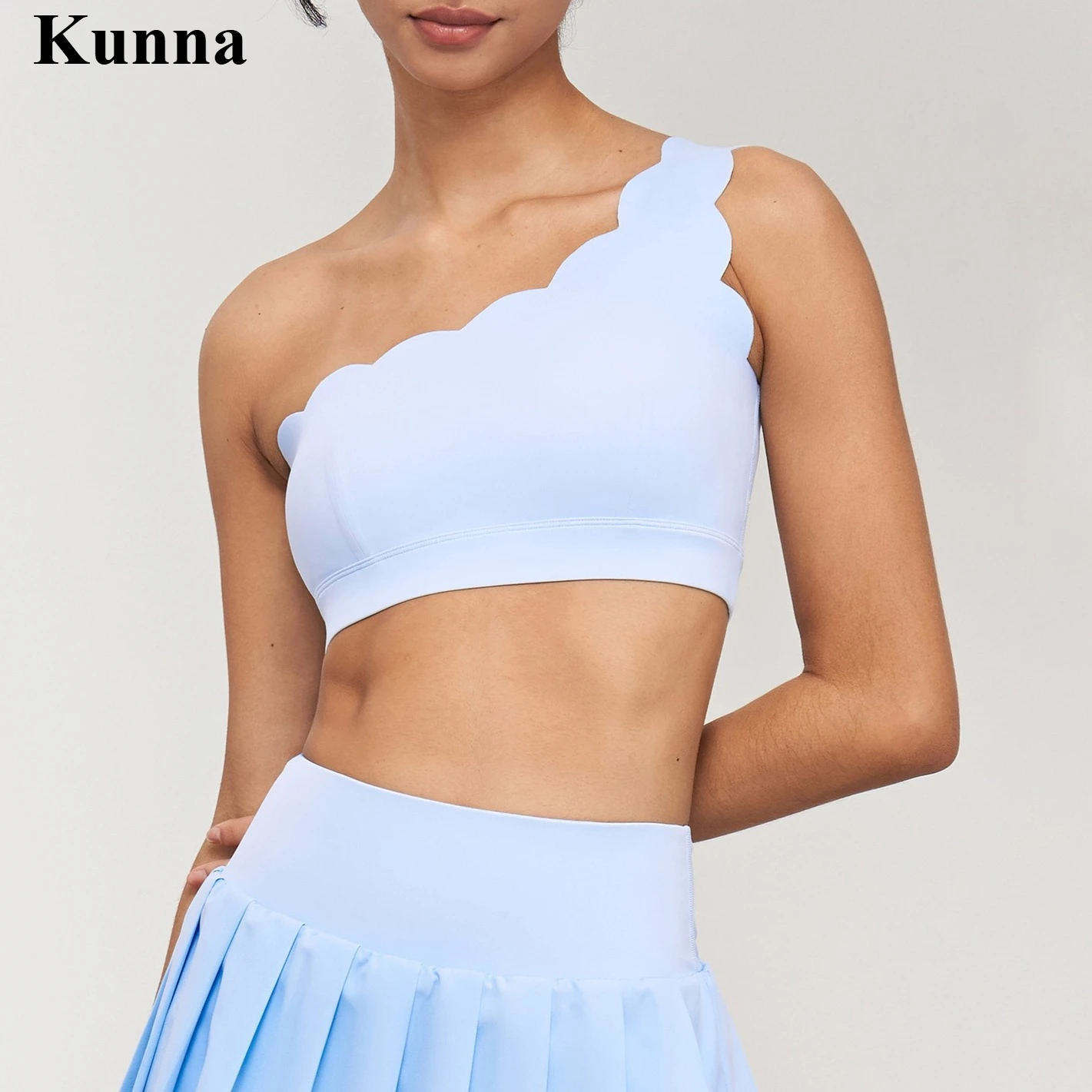 KUNNA Women's Medium Support Sports Bra with Built-in Pads - Single Strap Yoga Tank Top for Fitness
KUNNA Women's Medium Support Sports Bra with Built-in Pads - Single Strap Yoga Tank Top for Fitness