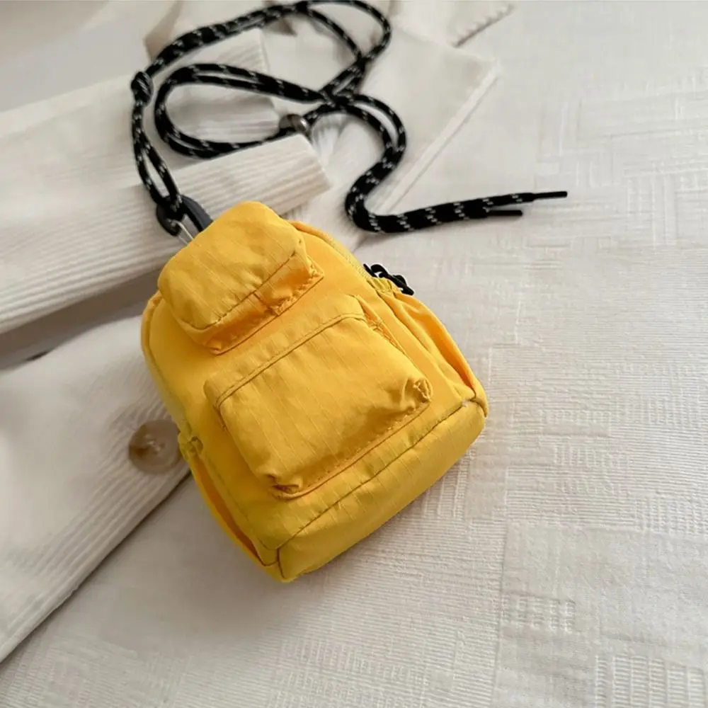Fashion Nylon Halter Coin Bag Large Capacity Multi-function Storage Bag Simple Coin Purse
Fashion Nylon Halter Coin Bag Large Capacity Multi-function Storage Bag Simple Coin Purse