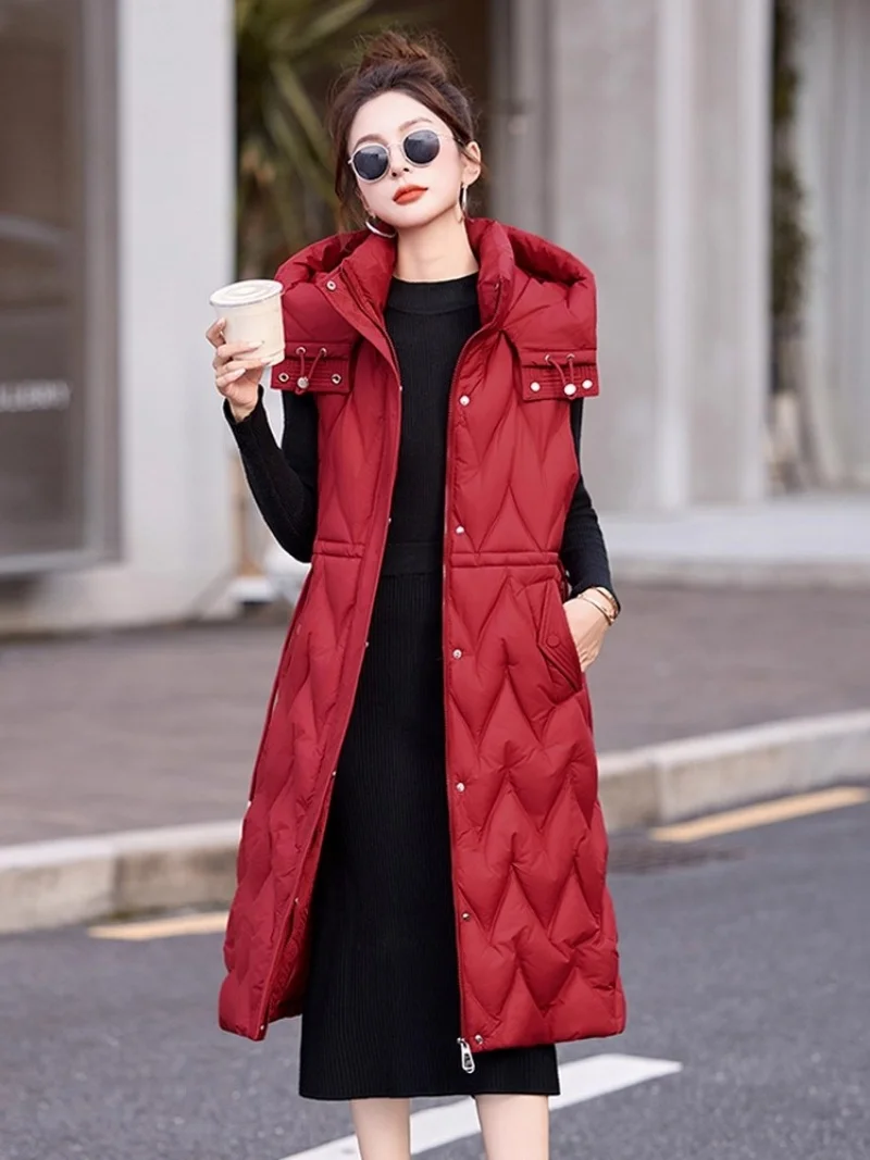 Hooded Down Cotton Vest For Women 2025 New Autumn And Winter Mid To Long Style Fashion Slim Design Sleeveless Parka Jacket w1174
Hooded Down Cotton Vest For Women 2025 New Autumn And Winter Mid To Long Style Fashion Slim Design Sleeveless Parka Jacket w1174