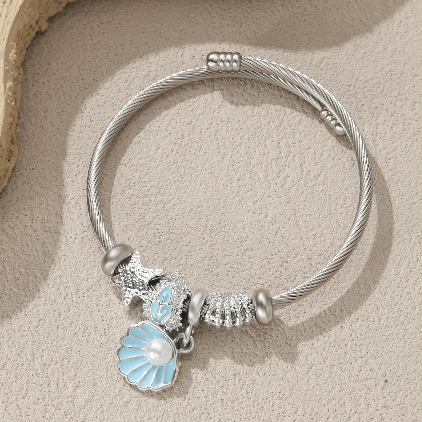 Silvery Tone Stainless Steel Ocean Charm Bangle with Shell and Starfish for Women
Silvery Tone Stainless Steel Ocean Charm Bangle with Shell and Starfish for Women