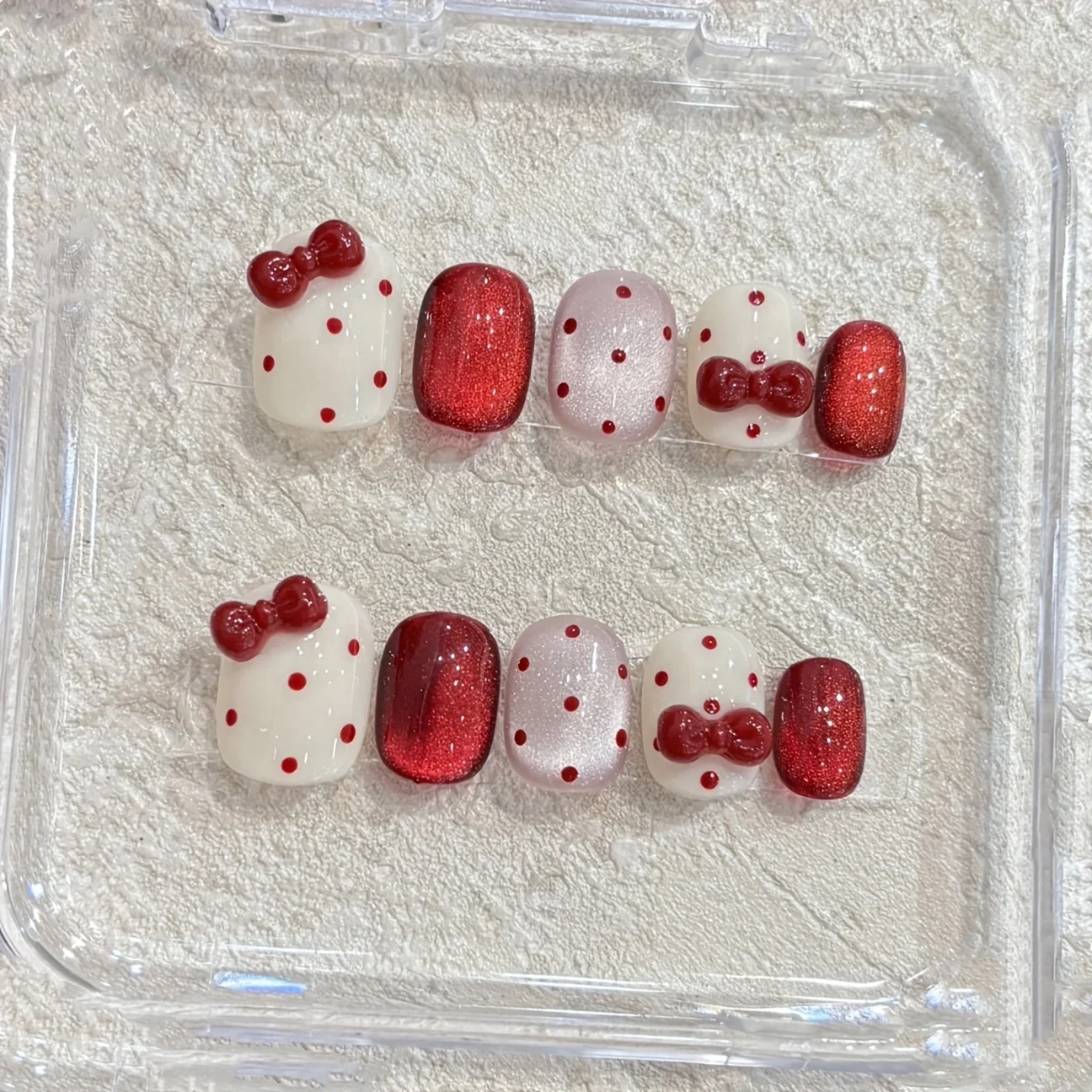 10pcs Handcrafted Red Bow Polka Dot Beige Base Color Cat's Eye Wearable Nails Short Square and Cute Fake Nails for Party Wedding
10pcs Handcrafted Red Bow Polka Dot Beige Base Color Cat's Eye Wearable Nails Short Square and Cute Fake Nails for Party Wedding