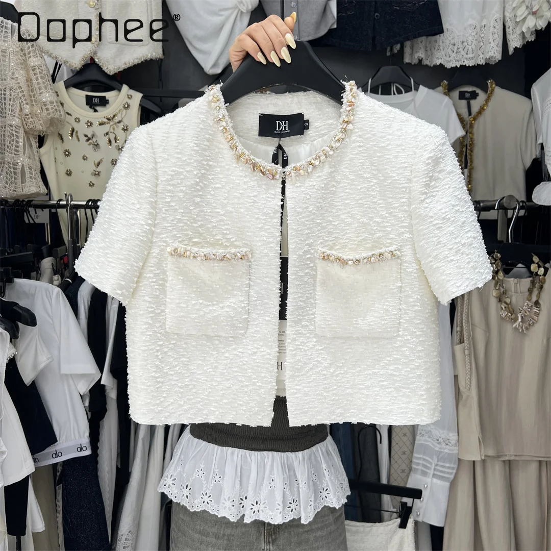Summer New Korean High-end Heavy Industry Beaded Thin Tweed Short-sleeved Jacket French Fashion Versatile Celebrity Short Jacket
Summer New Korean High-end Heavy Industry Beaded Thin Tweed Short-sleeved Jacket French Fashion Versatile Celebrity Short Jacket