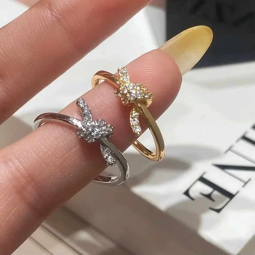 A simple, slightly set zircon knotted, niche design, light luxury and individual opening ring
A simple, slightly set zircon knotted, niche design, light luxury and individual opening ring