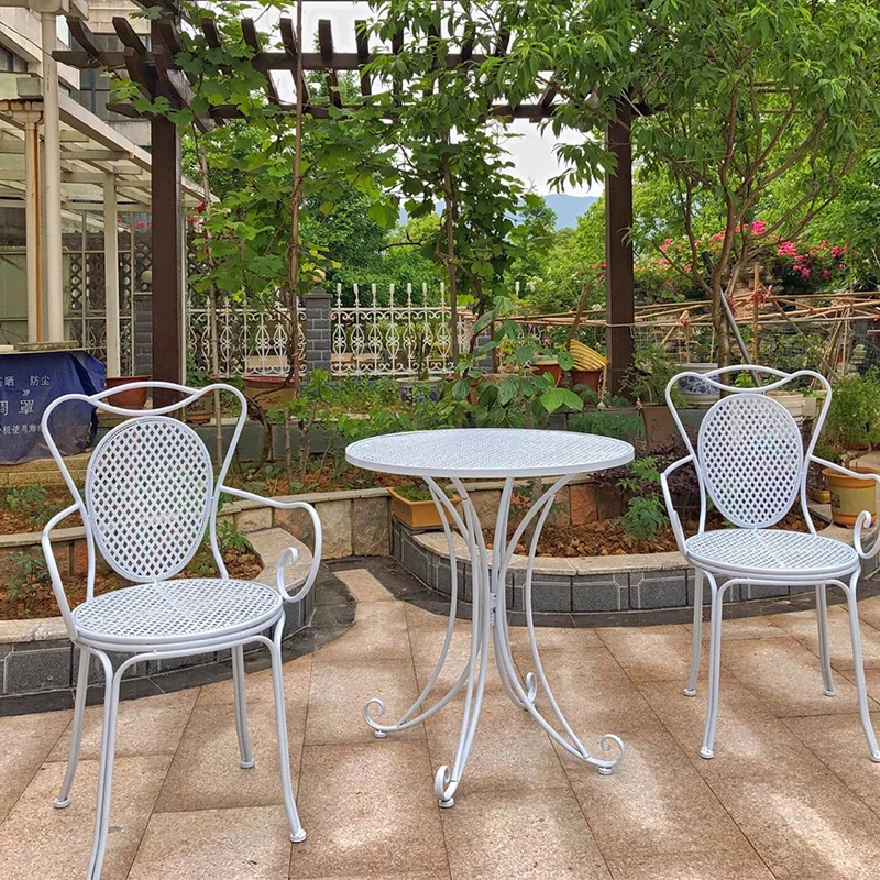 Wrought iron tables and chairs courtyard outdoor balcony garden outdoor round table
Wrought iron tables and chairs courtyard outdoor balcony garden outdoor round table