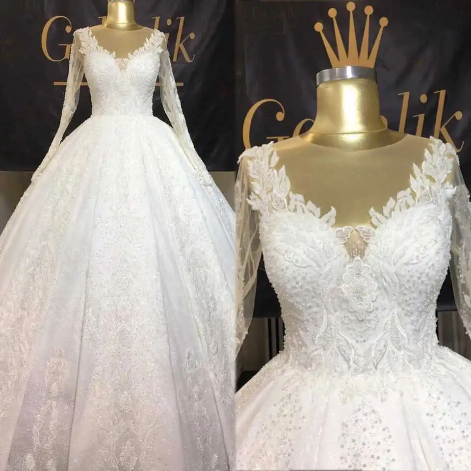 Customized Elegant Lace Wedding Dresses V-Neck Long Sleeve Ball Gown Beading Applique Bridal Gowns Customised
Customized Elegant Lace Wedding Dresses V-Neck Long Sleeve Ball Gown Beading Applique Bridal Gowns Customised