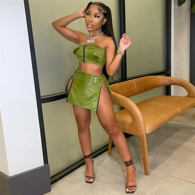 PU Leather Zipper Cargo Two Piece Set Women Summer Strapless Crop Tops High Side Slit Bodycon Mini Skirts Clubwear Dress Suit
PU Leather Zipper Cargo Two Piece Set Women Summer Strapless Crop Tops High Side Slit Bodycon Mini Skirts Clubwear Dress Suit
