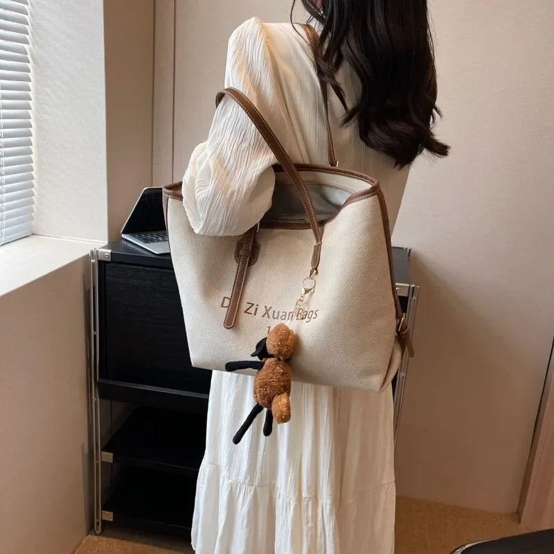 Niche Senior Commuter Class Shoulder Package Tote Canvas Handbags Simple Popular Big Capacity Women Bag Lightweight Canvas Bags
Niche Senior Commuter Class Shoulder Package Tote Canvas Handbags Simple Popular Big Capacity Women Bag Lightweight Canvas Bags