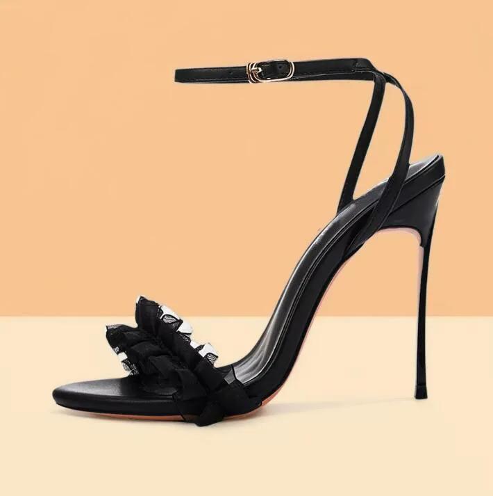 Sexy White Black Ruffles Open Toe Blade Heels Sandals Metal Stiletto High Heel Cross Ankle Strap Women Wedding Shoes
Sexy White Black Ruffles Open Toe Blade Heels Sandals Metal Stiletto High Heel Cross Ankle Strap Women Wedding Shoes