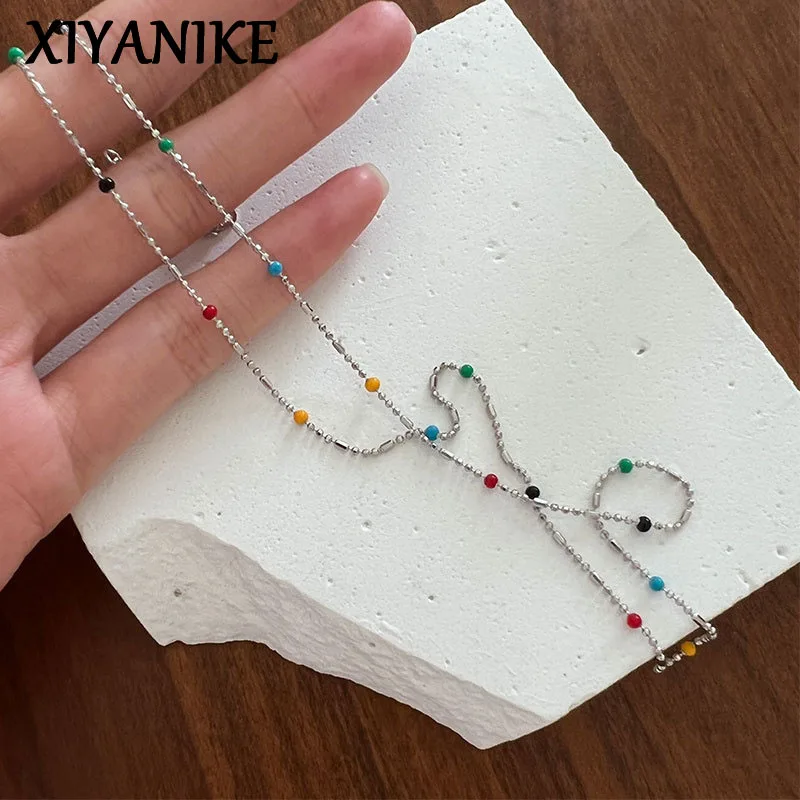 Тонкое ожерелье XIYANIKE с радужными бусинами для женщин и девушек, цепочка до ключиц, чокер, Новая Модная бижутерия, подарок, женские ожерелья
Тонкое ожерелье XIYANIKE с радужными бусинами для женщин и девушек, цепочка до ключиц, чокер, Новая Модная бижутерия, подарок, женские ожерелья