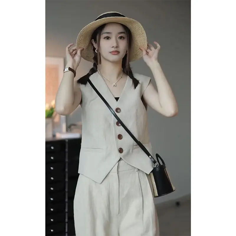 Весенне-летний корейский усовершенствованный стильный костюм, жилет из 2 предметов, женский темпераментный жилет без рукавов + широкие брюки, комплекты женских костюмов, наряд
Весенне-летний корейский усовершенствованный стильный костюм, жилет из 2 предметов, женский темпераментный жилет без рукавов + широкие брюки, комплекты женских костюмов, наряд