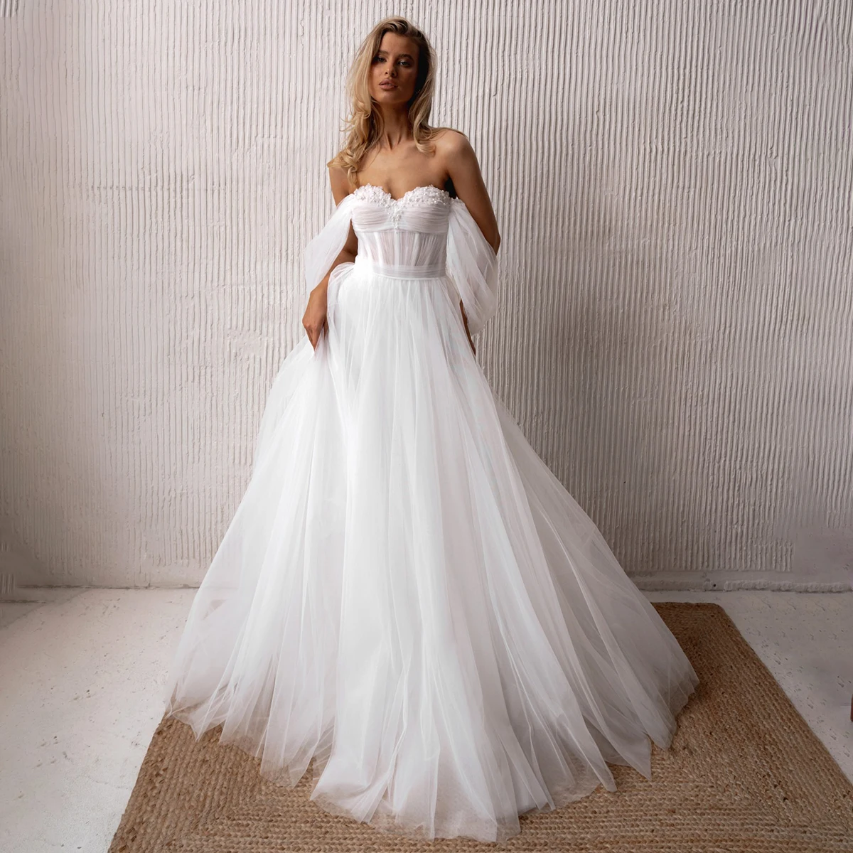 Romantic Vestidos Novia Tulle Pearl Wedding Dress For Bride Long Off Shoulder Ball Gown Puffy Sweetheart Bridal Gown For Women
Romantic Vestidos Novia Tulle Pearl Wedding Dress For Bride Long Off Shoulder Ball Gown Puffy Sweetheart Bridal Gown For Women