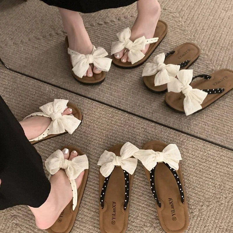 Elegant Flat Bottom Thong Slippers for Women Summer 2026 New Style Knot Outdoor Wearable Sandals Sweet Style PVC
Elegant Flat Bottom Thong Slippers for Women Summer 2026 New Style Knot Outdoor Wearable Sandals Sweet Style PVC
