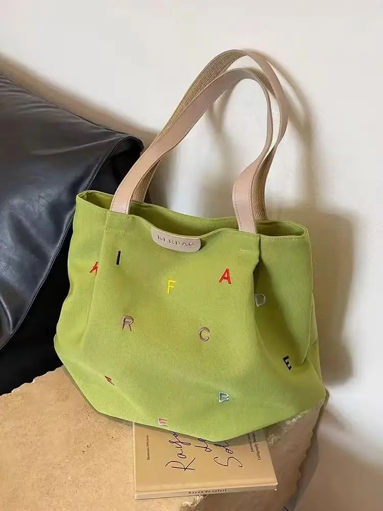Large-capacity Canvas Bag Female 2024 New Design Embroidered Letter Handbag Small Fresh Student One-shoulder Tote Bag
Large-capacity Canvas Bag Female 2024 New Design Embroidered Letter Handbag Small Fresh Student One-shoulder Tote Bag