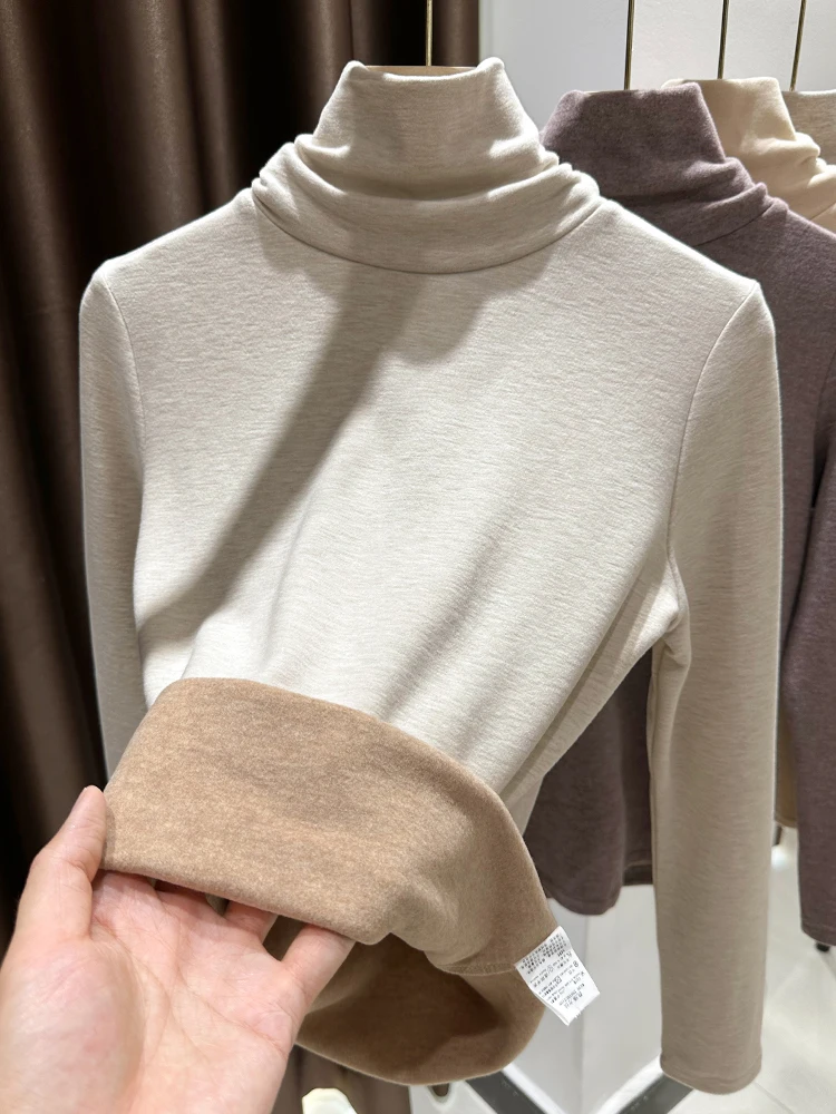 Утепленная вязаная водолазка с высоким воротником для женщин: модная, уютная, теплая, на флисовой подкладке, для зимних поездок на работу, однотонная.
Утепленная вязаная водолазка с высоким воротником для женщин: модная, уютная, теплая, на флисовой подкладке, для зимних поездок на работу, однотонная.